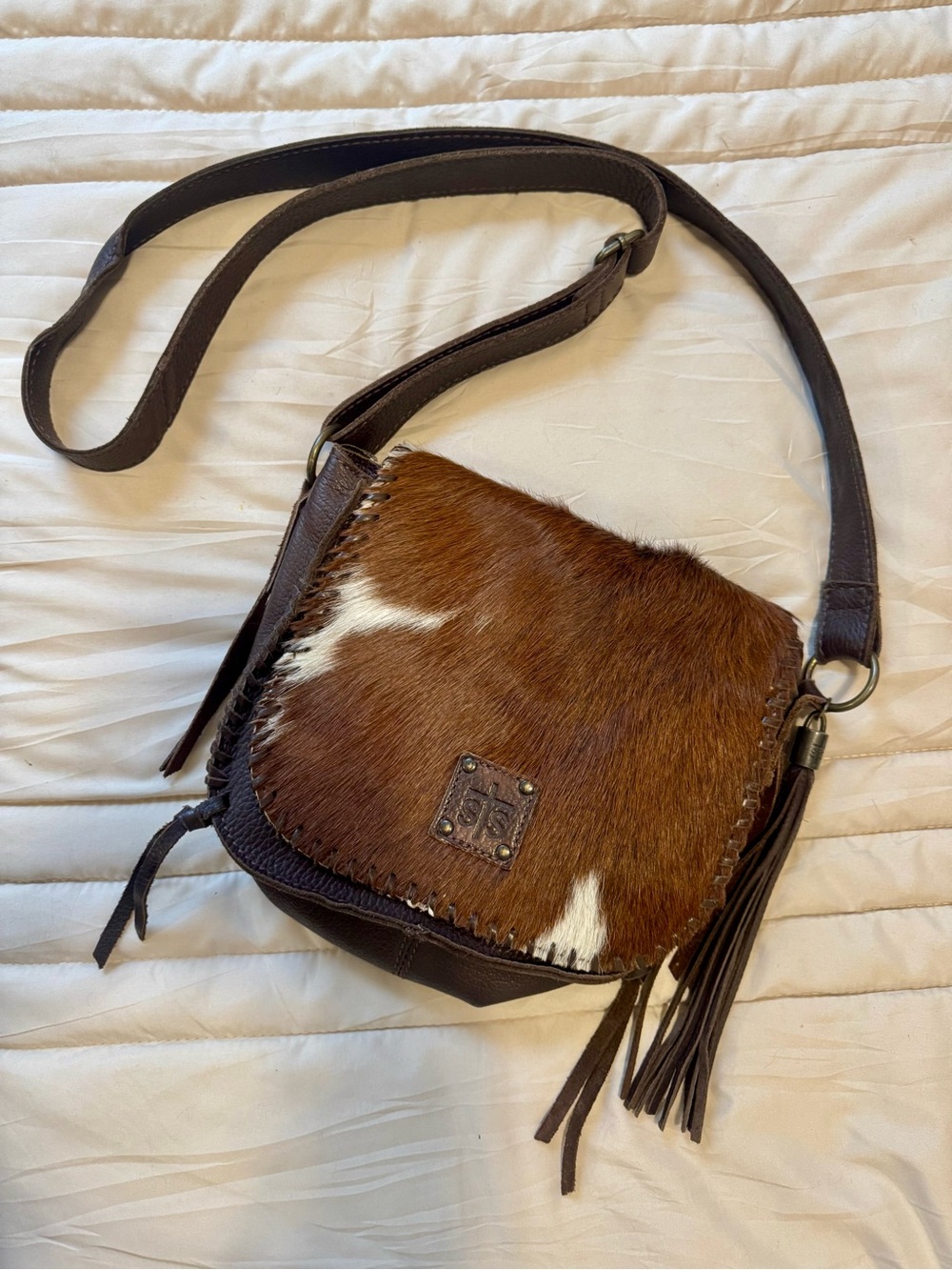 STS Ranchwear Brown and White Cowhide Leather Crossbody with Tassel Accent